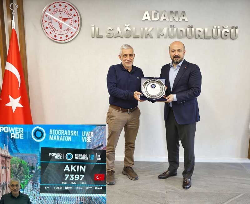 Belgrad Maratonu'nda İkinci olan Dr. Vural'a Halil Nacar'dan plaket